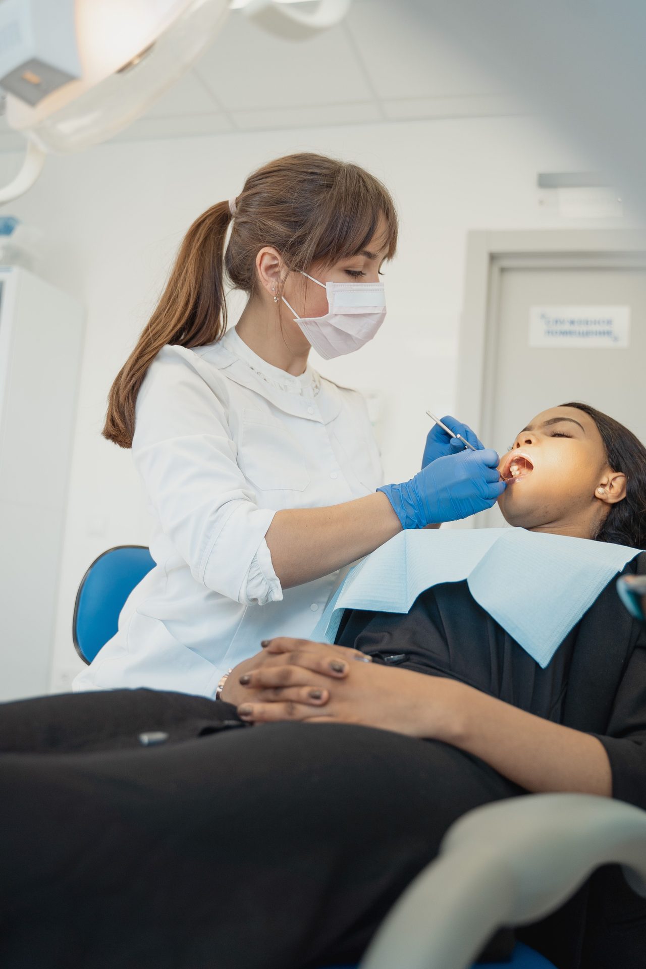 Consultation et examen bucco-dentaire